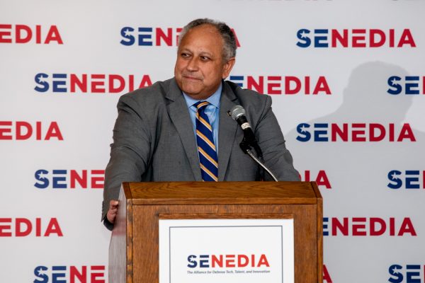 Secretary of the Navy Carlos Del Toro addressing SENEDIA's 2024 Defense Innovation Days